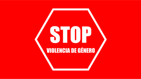 Señal de stop a la violencia de género sobre fondo rojo